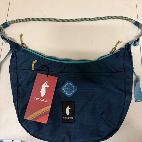 cotopaxi Handbags - Cotopaxi Navy Crossbody Bag with Teal Accents